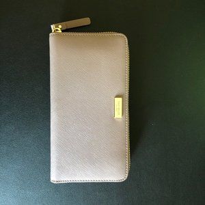 Kate Spade Laurel Way Neda in dusk cityscape..